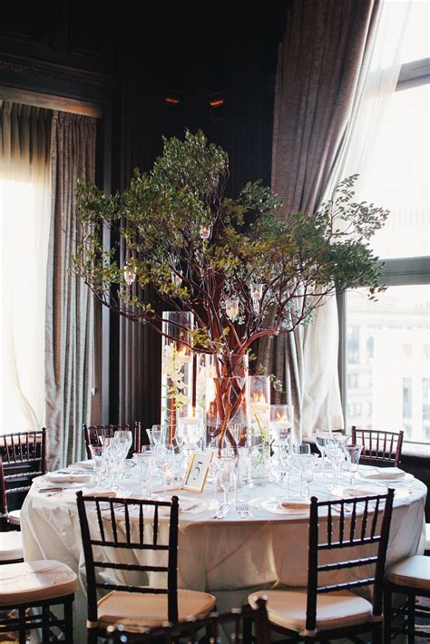Tree Centerpiece On White Dining Table