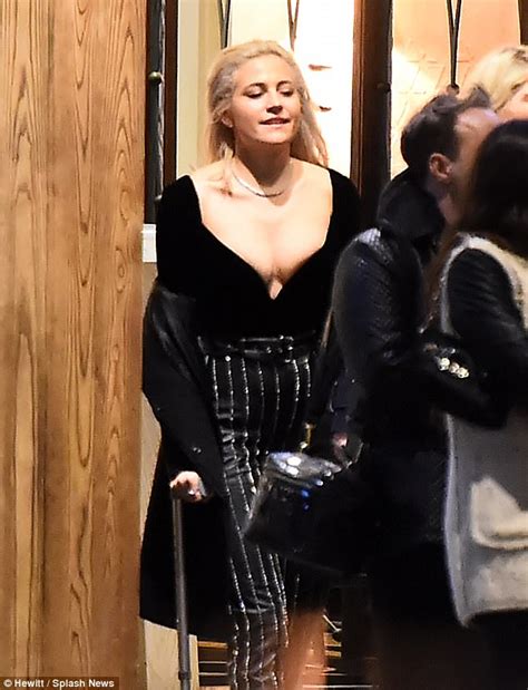 Pixie Lott Hobbles On Crutches As She Celebrates In London Daily Mail