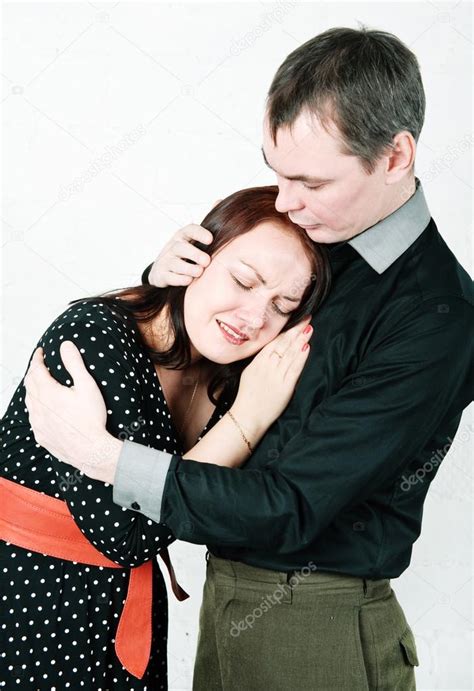 Man Comforting His Crying Woman — Stock Photo © Darkbird 18852073