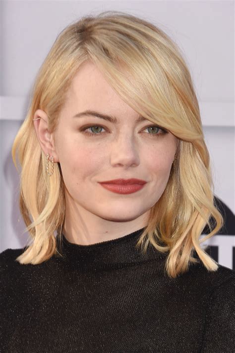 Emma Stone Wavy Golden Blonde Loose Waves Hairstyle Steal Her Style