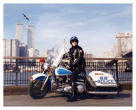 Female Police Officer In Front Of The Twin Towers Biker Outfit Motorcycle Outfit Motorcycle