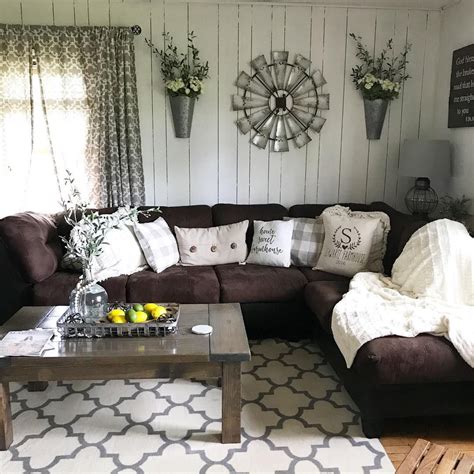 Farmhouse Living Room With Brown Couch