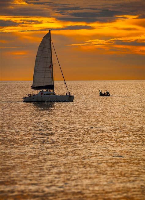 Catamaran Sailboat On A Tropical Sea At Sunset Stock Image Image Of