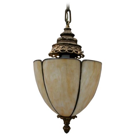 Pendant lights are a great way to add lighting without overpowering the other design elements in a room. Pretty 1920's Pendant Fixture at 1stdibs