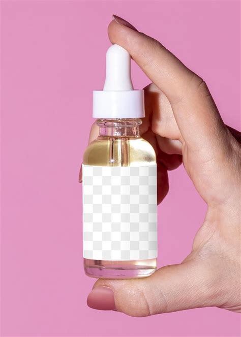 Woman Holding A Skin Care Dropper Bottle Mockup Premium Image By Mckinsey