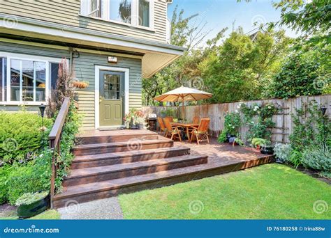 Backyard Area With Walkout Deck And Well Kept Lawn Stock Photo Image