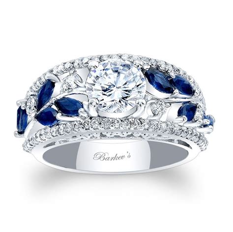Tw., 56 round brilliant cut diamonds weighing approximately 1/4 ct. BLUE SAPPHIRE ENGAGEMENT RING at www ...