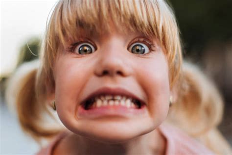 Kid Making Funny Face Stock Photos Pictures And Royalty Free Images Istock