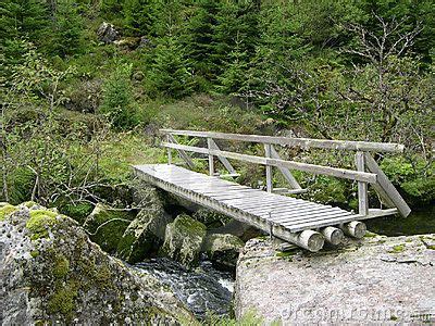 Jun 28, 2011 · by larry walton. Rustic bridge over creek | Garden bridge, Backyard bridges ...