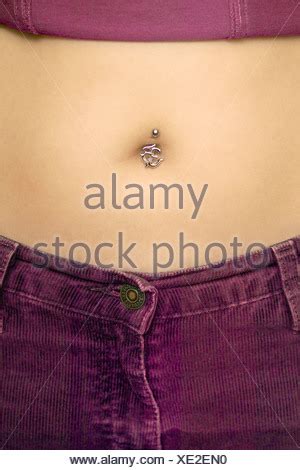 Girl S Belly Button Piercing Stock Photo 4278073 Alamy