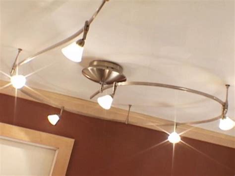 Install your drop ceiling perpendicular to the joists. Install Track Lights for Instant Flair | HGTV