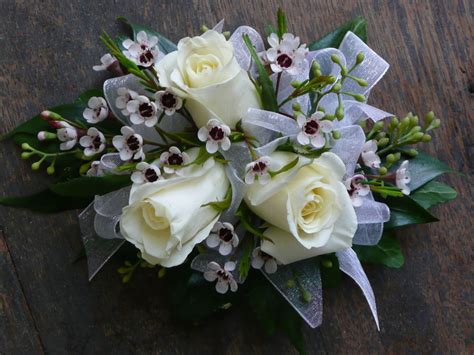 White Sweetheart Roses And Waxflower Wrist Corsage Wedding Flower