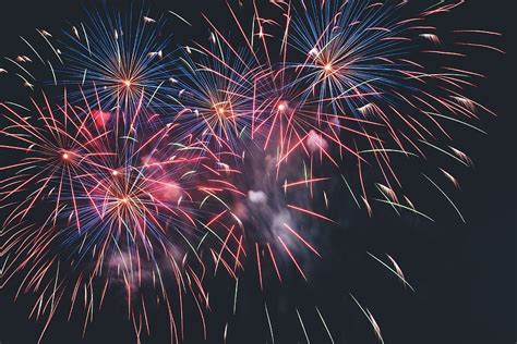Three Color Fireworks Displaying Against Black Sky Hoodoo Wallpaper