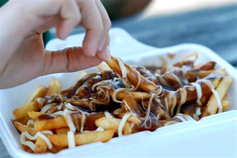 8 Photos Of Gooey Poutine That Will Make You Want To Eat Poutine Right