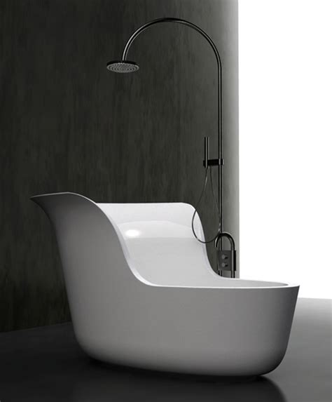 Tubs for small bathrooms can also be shower baths, as they offer two in one functionality and can fit in a corner without much hassle. Small Soaking Tub Shower Combo by Marmorin
