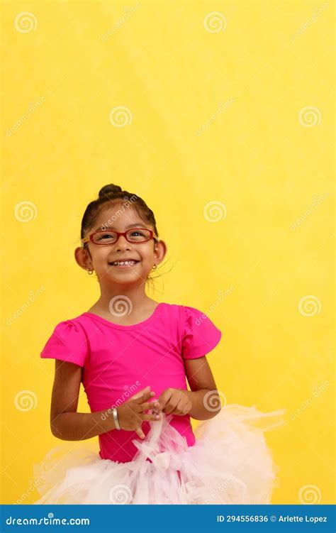 4 Year Old Latin Brunette Girl Dressed As A Ballerina Practices Ballet