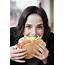 Woman Eating Sandwich  Stock Image F003/7383 Science Photo Library