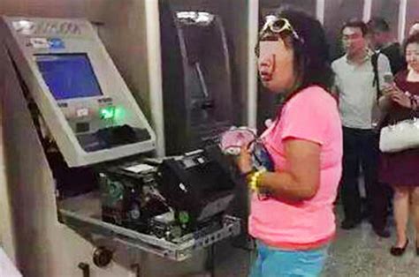 Women Rips Open Atm With Her Bare Hands After It Swallowed Her Card