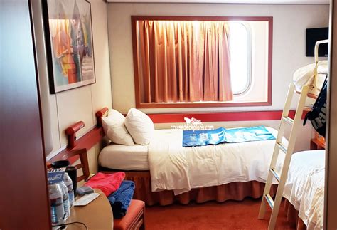 Actual cabin decor, details and layout may vary by stateroom category and type. Carnival Sensation Cabins - cabin