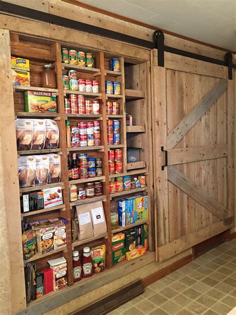 Before building a pantry in your garage, consider the temperature. Between the Studs Pantry with Barn Door | Armoires de ...