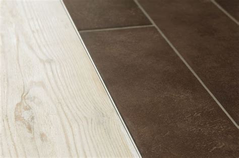Typical applications include edge protection where tile is bordered by carpet, at expansion joints, or as a decorative edging for stairs. SCHLUTER SYSTEMS - Profilé de sol Schlüter®-SCHIENE-AE ...