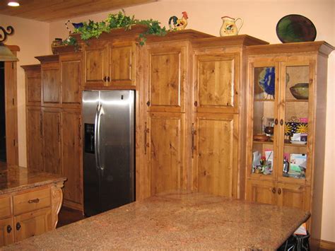 Creatingting high quality custom european cabinets to traditional custom cabinets for your kitchen, bath, tv wall units. Knotty Alder Kitchen Cabinets | Flickr - Photo Sharing!