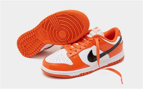 Nike Presents The Dunk Low In White Orange And Black Patent Leather