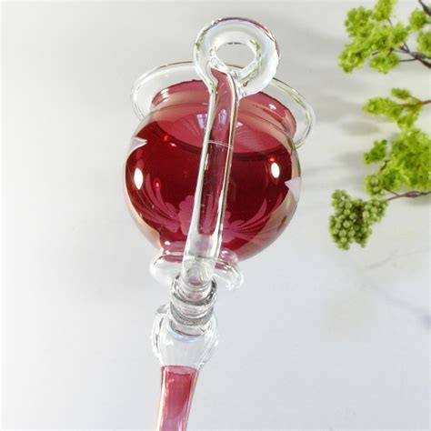 Also elegant silk topiary petal balls that top off 24 vases with crystal strands and hanging pendulum crystal illuminated with an led light! Glass Sconce | Antiques Board