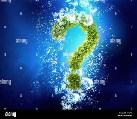 Green Question Mark In Clear Blue Water Stock Photo Alamy
