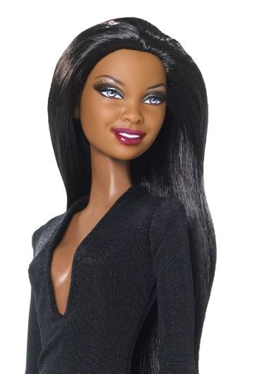 She comes with a new gown, necklace, earrings and heels. Dolls: It Matters If You're Black or White - Adios Barbie
