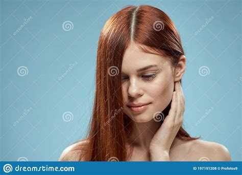 Beautiful Brunette Long Hair Naked Shoulders Cosmetics Charm Health Care Blue Background Stock