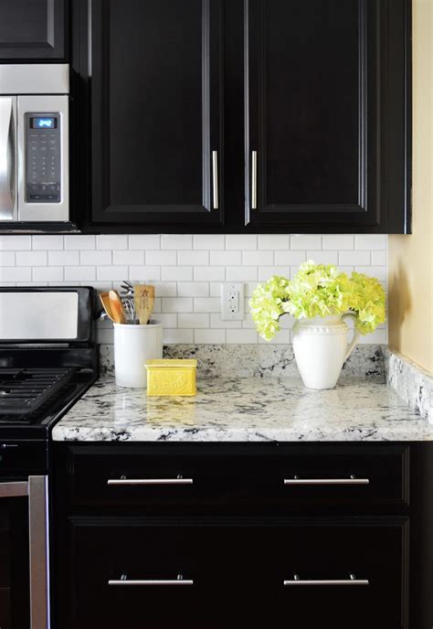 Subway tile is both classic and contemporary. Installing A Subway Tile Backsplash For $200 | Young House ...