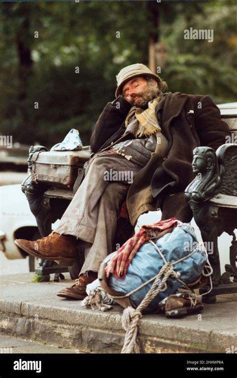 Tramp Hobo Homeless Man Sitting On Bench Stock Photo Alamy