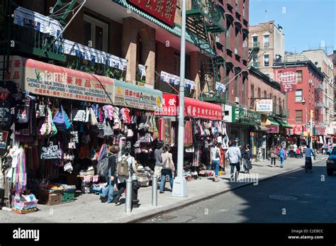 Busy Street With Shops And Chinese Script Signs Chinatown Manhattan