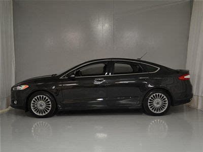 2013 fusion 2.0l se tuxedo black metallic ext./piano black int. Purchase used 2013 FORD FUSION TITANIUM TUXEDO BLACK ...