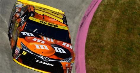 Swarms of cars pack on the racing track in an intense struggle to reach the finishing line. NASCAR Race Mom: #NASCAR Cup Season Finale Promises Excitement