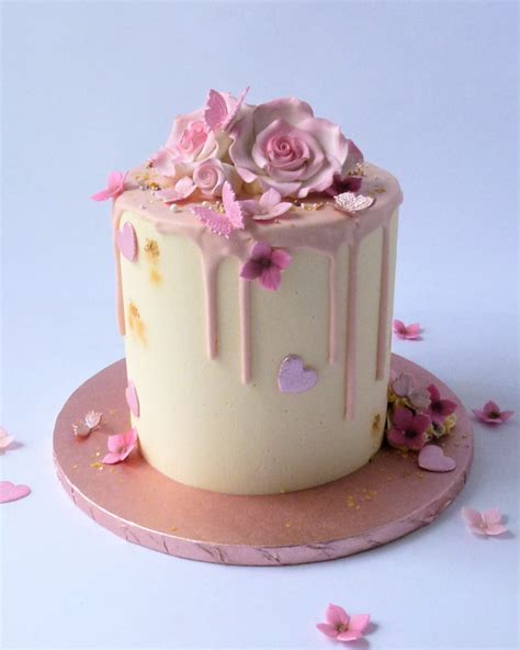 pastel drip cake with sugar flowers karen s cakes