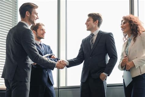 Premium Photo Business People Shaking Hands Finishing Up A Meeting