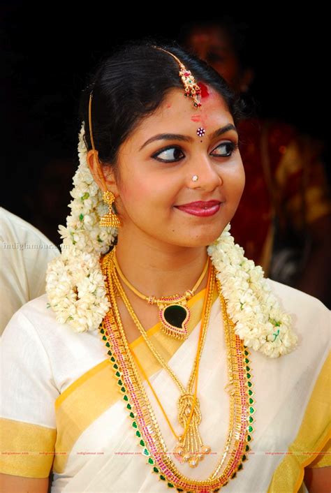 Ambili devi has said that her husband adityan jayan threatened her of dire consequences if she does not seek a divorce from him. Actress Ambili Devi's Wedding HD photos,stills-indiglamour ...