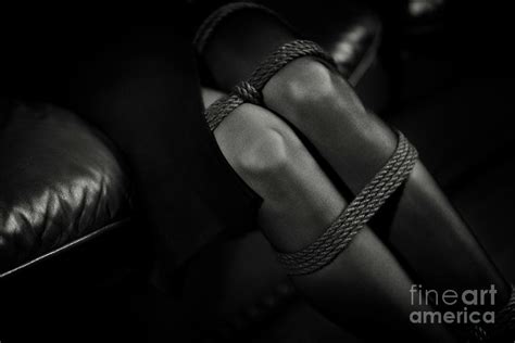 sexy black and white closeup of woman knees in stockings with he photograph by awen fine art prints