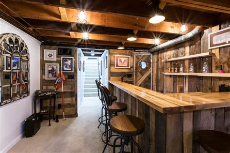 The Bar Is Made Out Of Wood And Has Several Stools