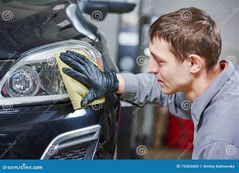 Auto Mechanic Buffing And Polishing Car Headlight Stock Photo Image