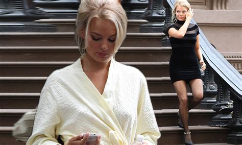 Margot Robbie Goes From Dressing Gown To Seductive Mini Dress As She