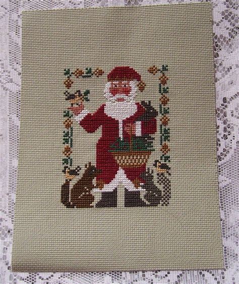 Prairie Schooler Completed Cross Stitch Nature Santa with the | Etsy | Completed cross stitch ...