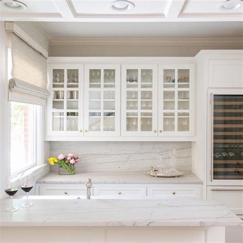 Our kitchen cabinet handles include styles and colours to suit every kitchen design. Glass Front Kitchen Cabinets with Gold Knobs ...
