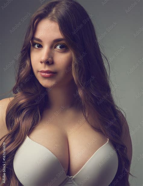 Young Girl With Big Breasts Posing In A Bra Foto De Stock Adobe Stock