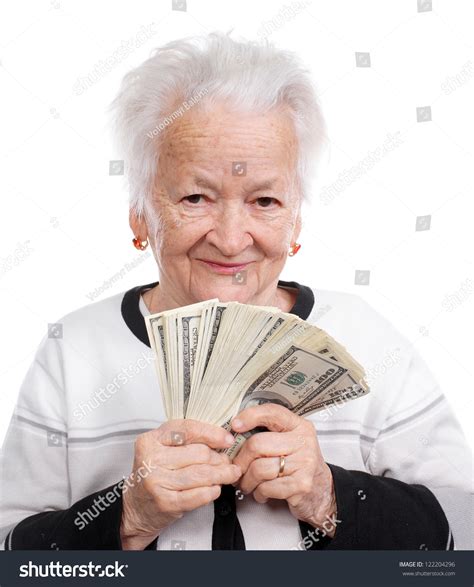 Portrait Of An Old Woman Holding Money In Hand On White Background