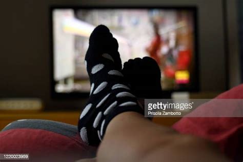 Socks Couch Television Female Photos And Premium High Res Pictures