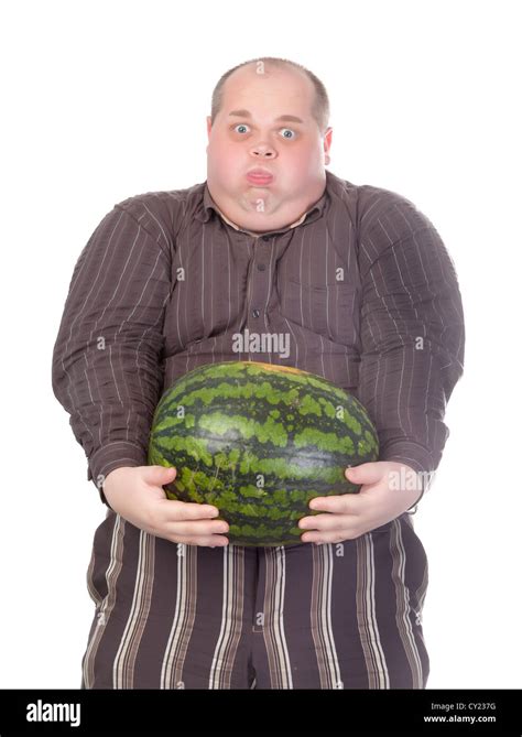Unfit Obese Man Struggling To Hold The Weight Of A Whole Watermelon