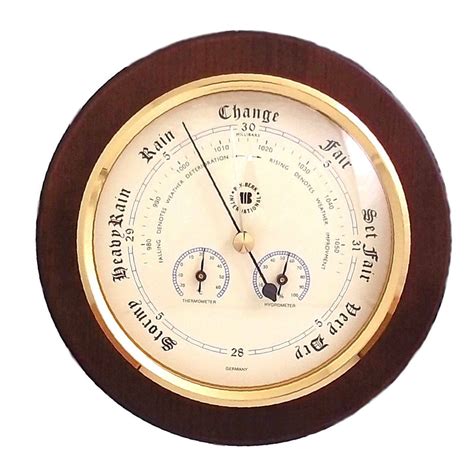 International Brass Barometer Thermometer And Hygrometer On Cherry